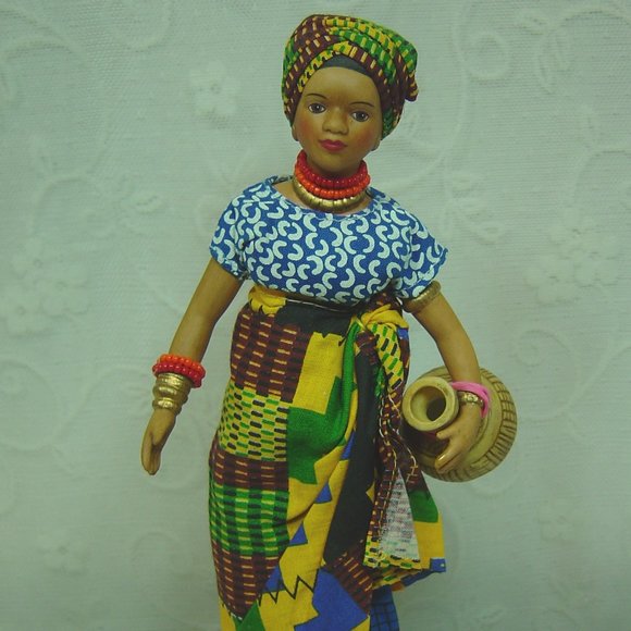 Other - 8" porcelain doll--dark skinned native woman carrying water jug